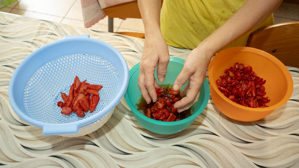 Sundried tomatoes washed in vinegar in the kitchen